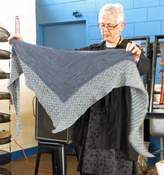 Among the pieces Shelby brought to show us were the wool deflected doubleweave shawl on the left and the Melanie Berg knit shawl on the right.