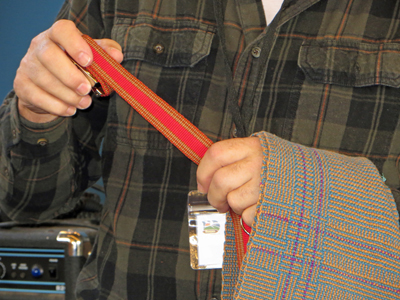 Tom wove the inkle belt (using embroidery floss) and a multi-colored log cabin weave scarf.