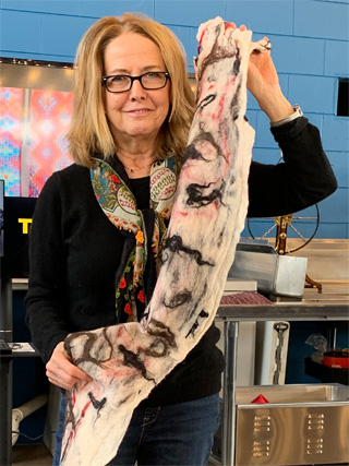 Sherron attended a felting workshop and made the scarf in the photo on the left.