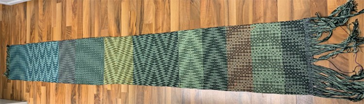 From Sue: My sampler is Falling Stars. Here it is off the loom showing all the Echo and Jin treadlings I used.