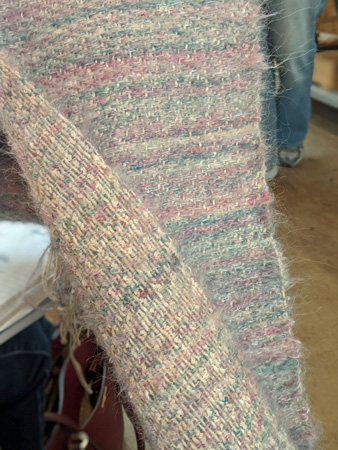 nspired by Mary's creativity, Tom wove this shawl with a mixed warp and two types of fuzzy wefts.