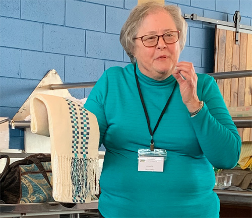 Jan brought a scarf she had woven using acrylic yarn along with cotton yarn for a central stripe of monk's belt weave.