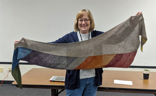 Sue knit her shawl using merino, yak and nylon yarn,