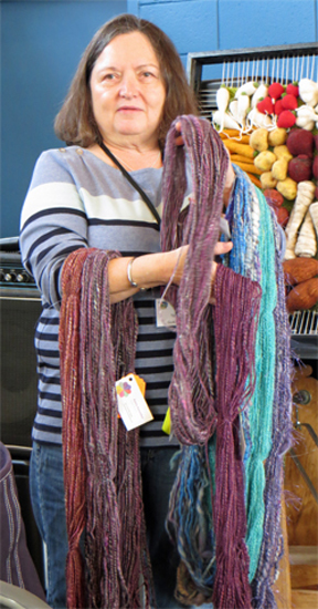 Terry brought many skeins of yarn she had spun with different grists, colors, and fibers, including wool with silk noil.