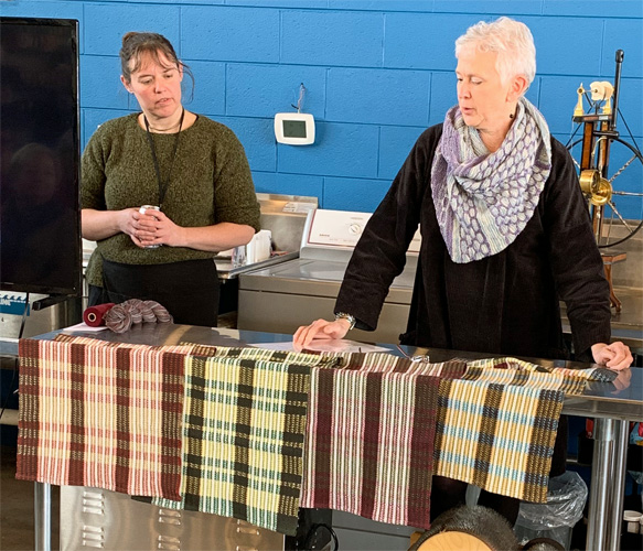 Shelby's challenge was to weave using a 12 dent reed, with alternate colors, borders and a stretchy texture, and in the form of a gamp or four weaves. She met her challenges with the four very attractive towels in the photo above. Their alternating colors and borders are obvious from a distance. To appreciate the four twill patterns that are in each towel, zoom in if you can. (Combining different twill weaves in a single piece can be very tricky.) Shelby also demonstrated that the towels were slightly stretchy (when pulled on their bias :-).