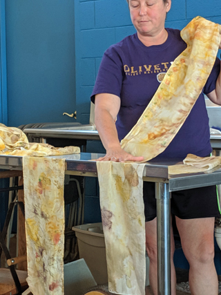 In a Michigan Fiber Festival class, Chris dyed these silk scarves using different mordants and leaves collected from nature to produce colors and patterns.