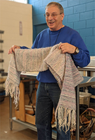 nspired by Mary's creativity, Tom wove this shawl with a mixed warp and two types of fuzzy wefts.