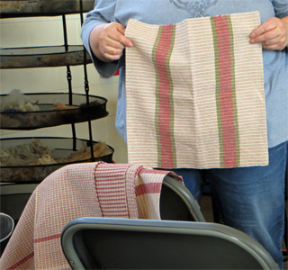 On a 5-yard warp, Jamie wove a basket cover and 4 towels in different weaves and colors using cotton and cotton-linen blend yarns.